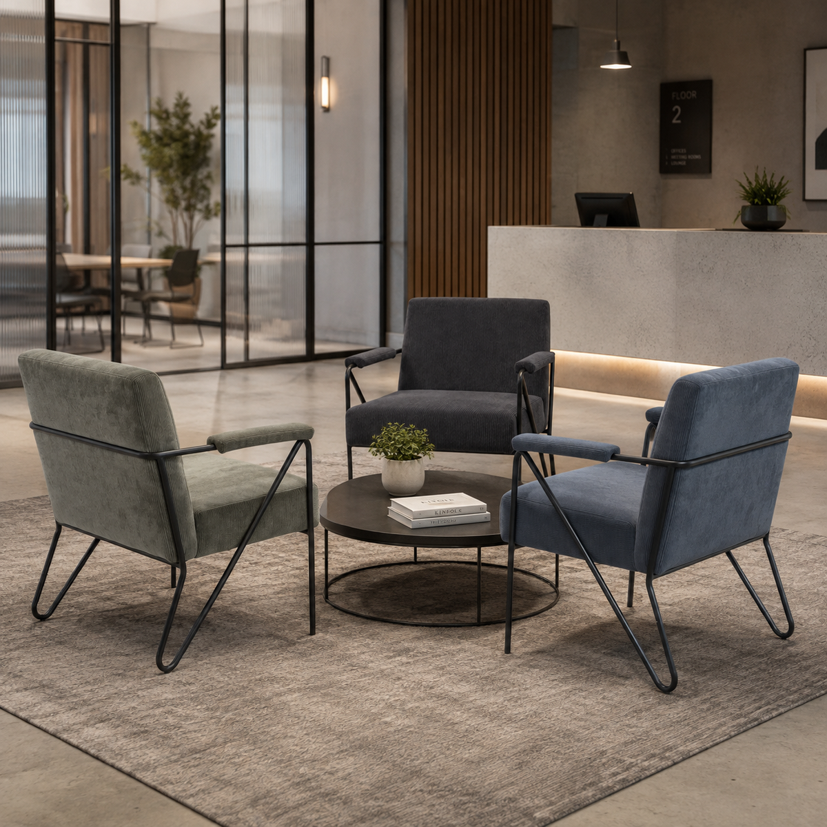 Corduroy lounge chairs in a hospitality waiting area with reception desk, mixed muted colours and black steel frames, RC-02