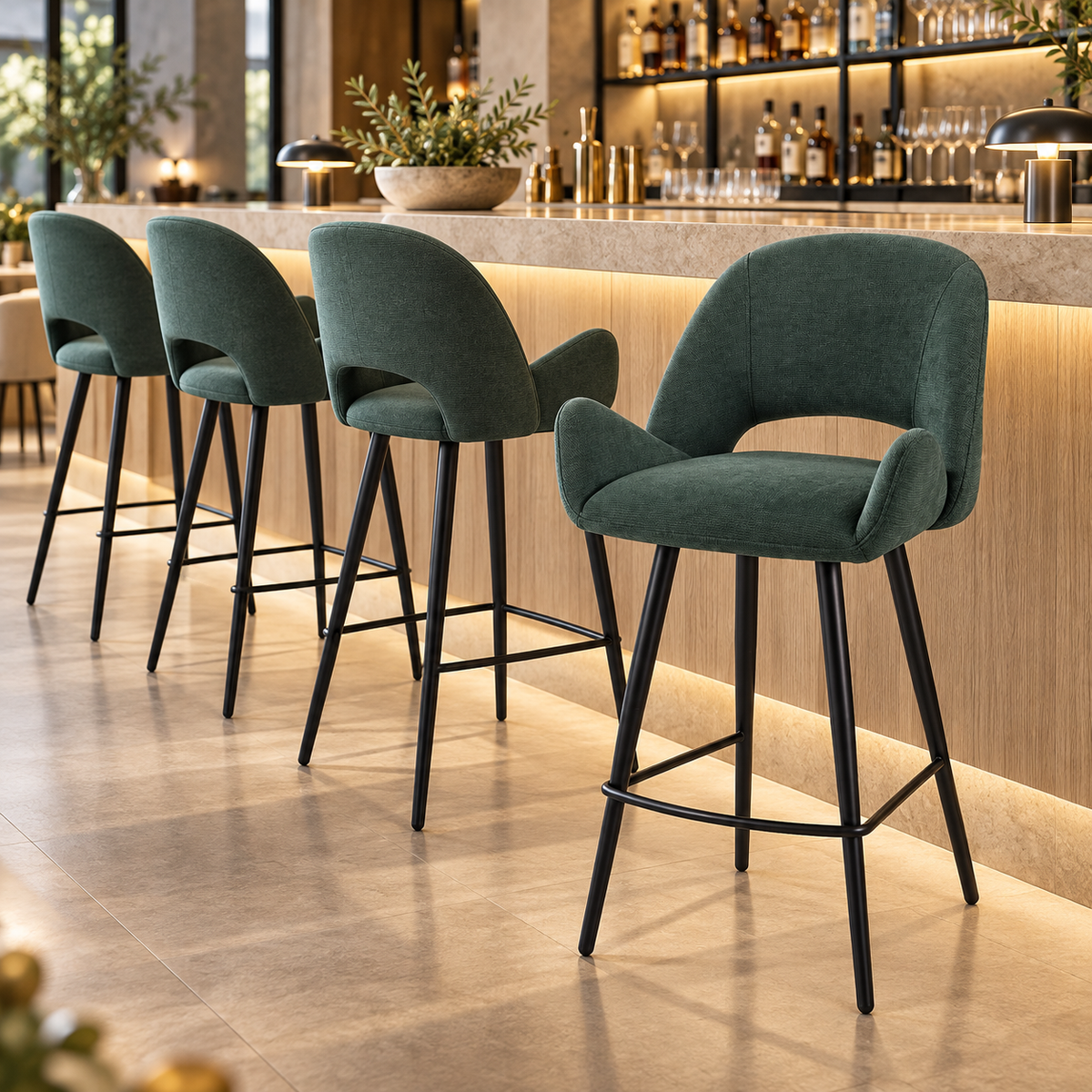 Deep green open-back bar stools arranged along an illuminated hotel lounge counter, BC-179-750