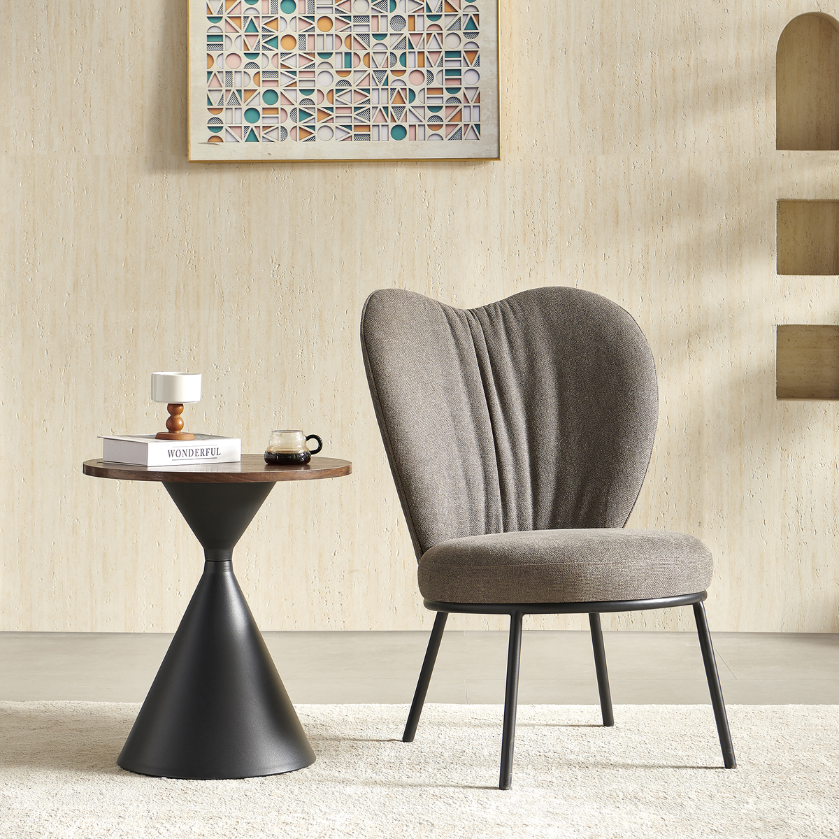 Double-lobed lounge chair in charcoal paired with pedestal side table for gallery lounge areas RC-17