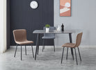 T-107 Sintered Stone Rectangular Dining Table in Residential Dining Setting — Armani Grey Top, Matte Black Splayed Legs — GEYA Seating
