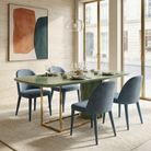 Asymmetric dining table in khaki green with dusty blue chairs in a private dining setting, T-64