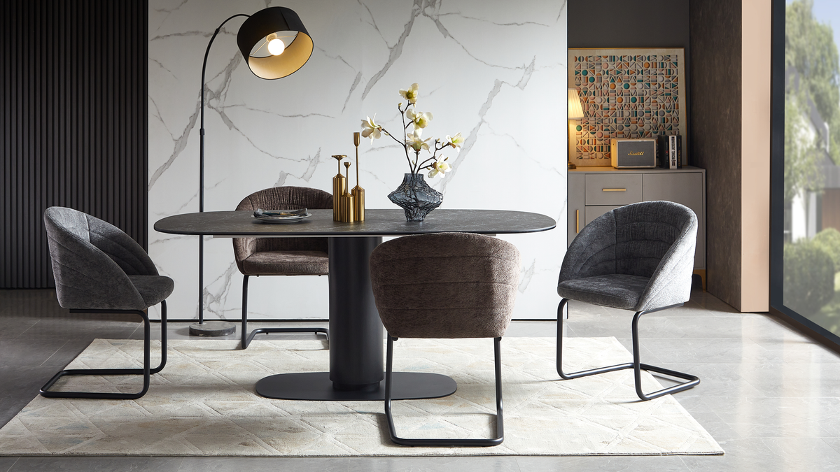 Barrel-curved sintered stone dining table with cantilever chairs in a contemporary apartment dining space, T-99