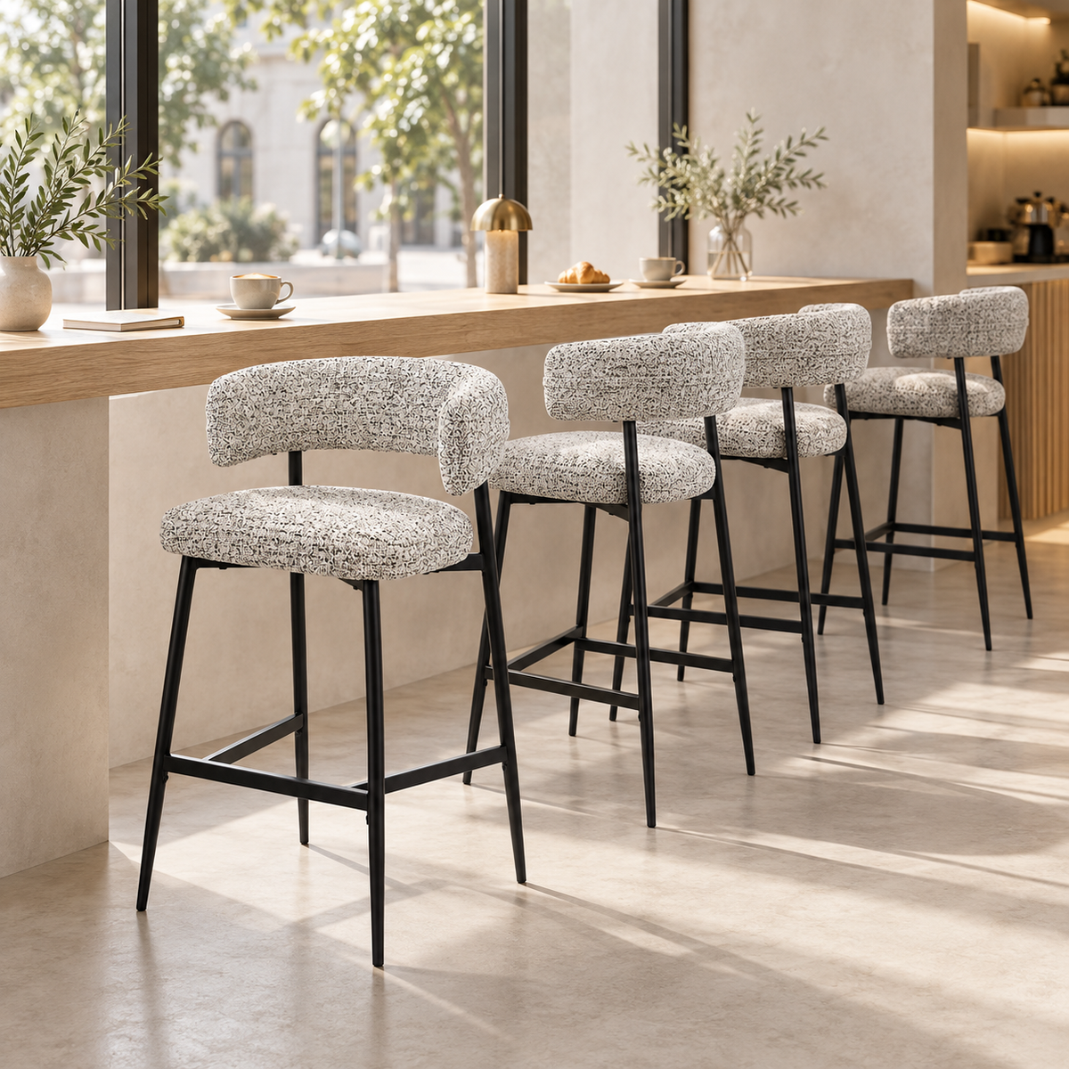 Bouclé bar stools with black-and-white upholstery arranged in a row along a counter, showing repeated backrests and footrests, BC-89-750