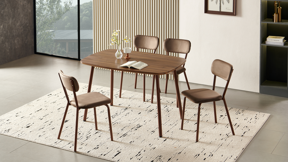 Bow-top walnut dining table paired with four upholstered chairs against a slatted timber wall, T-189