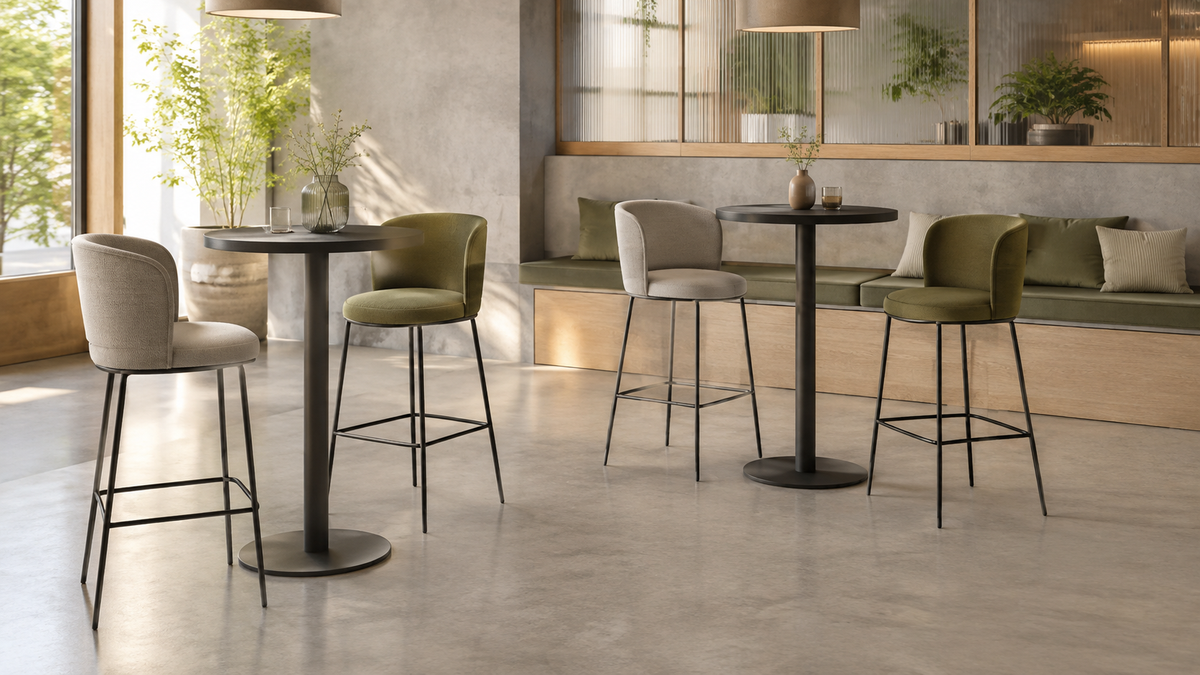 Upholstered counter-height stools and tables in a contemporary café and bistro setting.