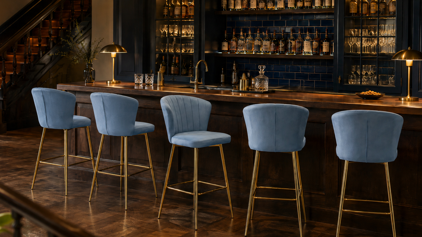 Channel-stitched velvet counter stools at boutique bar counter in Dusty Blue, dark timber and brass interior, hospitality seating, BC-90