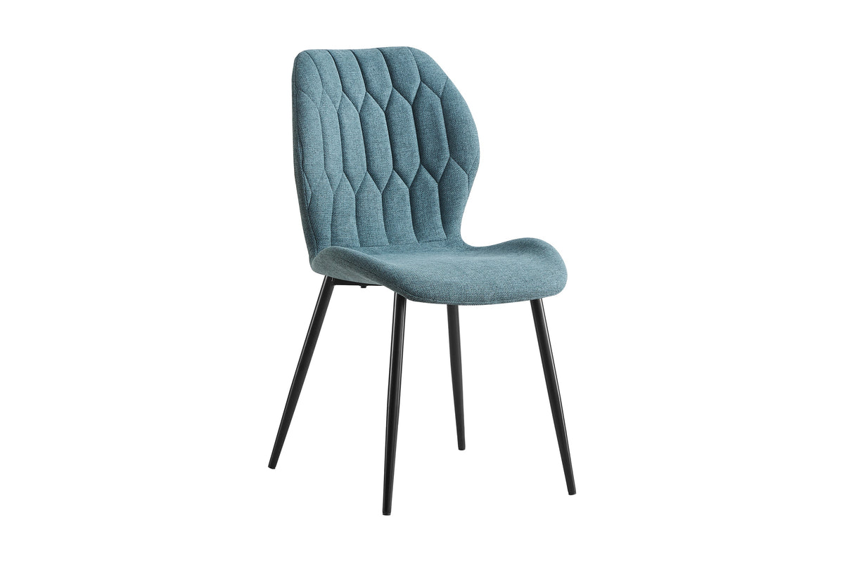 Dining chair in teal, three-quarter view showing textured quilted facets and matte black frame, DC-3071