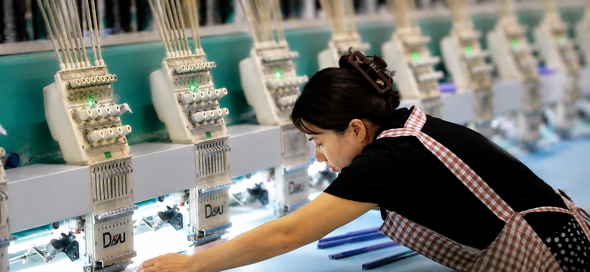 Automated embroidery and upholstery production line for dining side chairs at GEYA