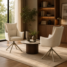 High-back upholstered swivel armchairs for executive lounge seating with grid-quilted warm ivory woven fabric and four-star metal bases.