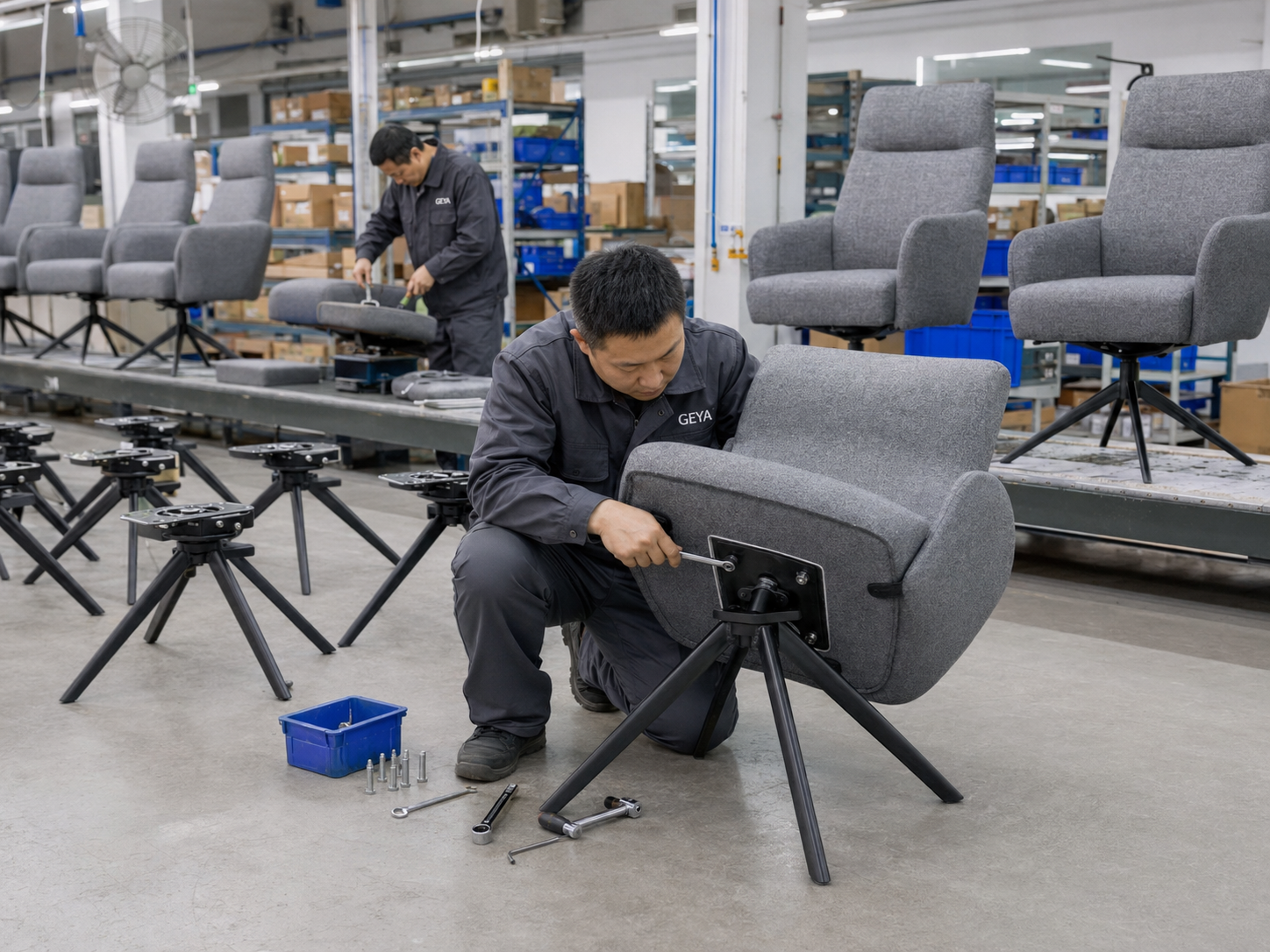 Trial assembly of an upholstered light office chair with four-leg swivel base before KD packing