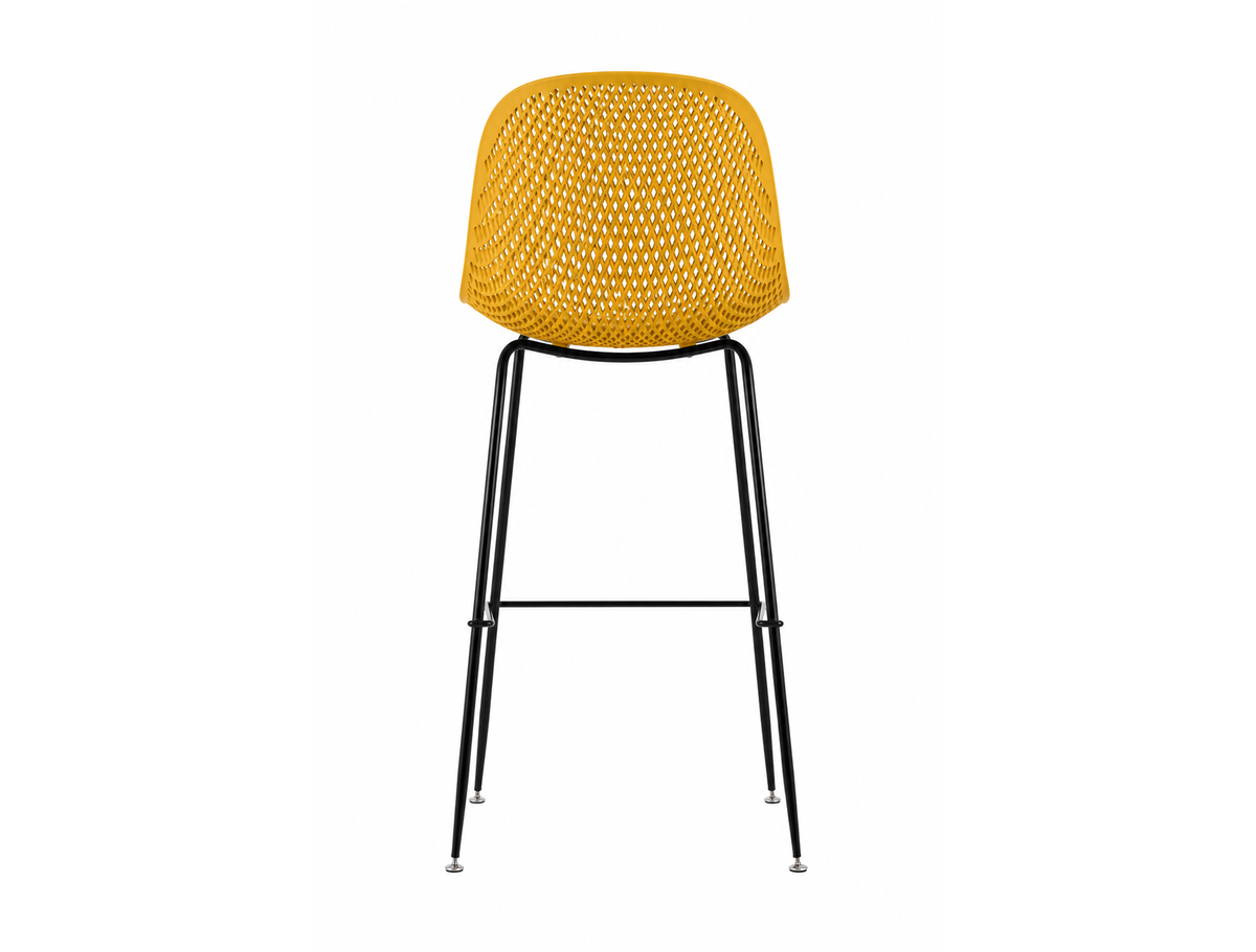 Perforated polypropylene bar stool in mustard yellow, rear view showing open-lattice back shell, integrated footrest rail and tapered steel legs, PC-76