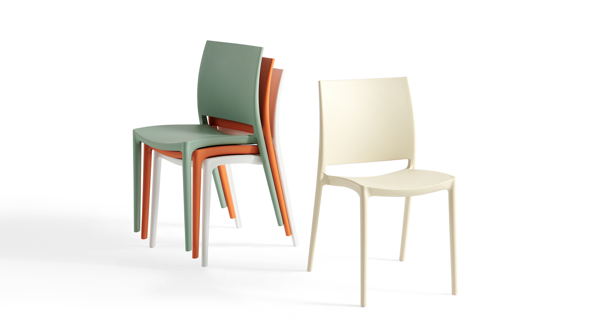 Stackable polypropylene side chairs in multiple colors showing vertical stacking for commercial storage PC-100