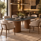 Sintered stone pedestal dining table with beige armchairs in a boutique hotel restaurant, T-136