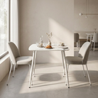 Square white sintered stone dining table arranged with coffee and pastry in a bright cafe nook, T-123

