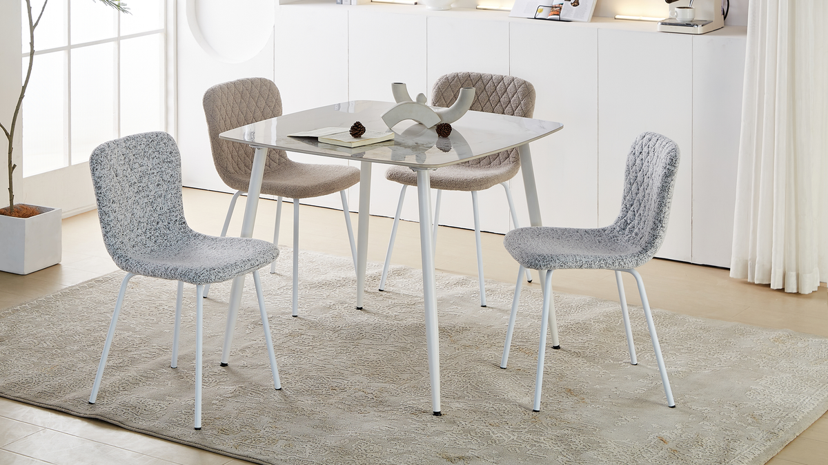 Multiple square white sintered stone dining tables arranged along tall windows and a coffee bar, T-123

