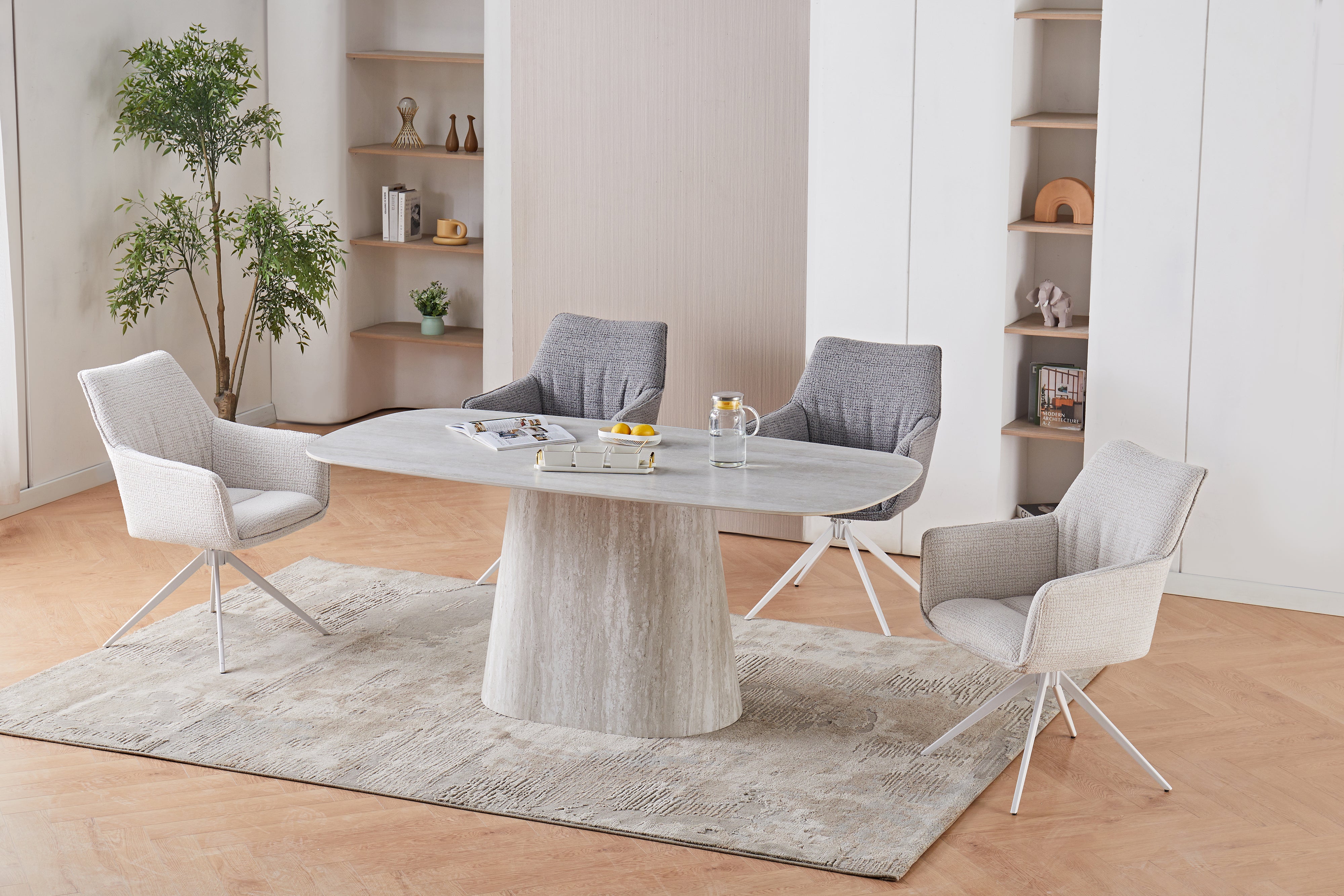 T-131 Rounded Rectangular Dining Table in Residential Dining Room — Travertine White Sintered Stone Top, Tapered Pedestal Base, Styled with Upholstered Dining Chairs — GEYA Seating

