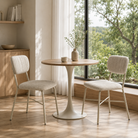 bouclé channel-quilted round-leg side chairs warm ivory beige oak dining table floor-to-ceiling window dc-3261-a